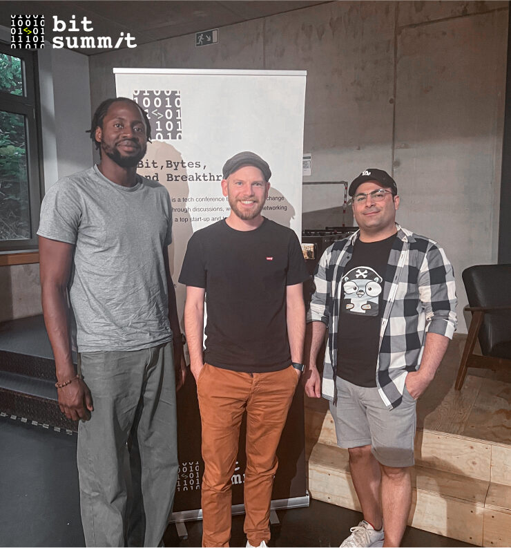 Three man standing next to each other