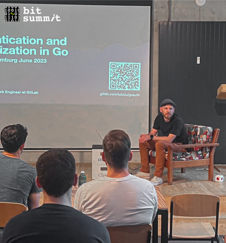 A developer presenting about Golang to a group of people