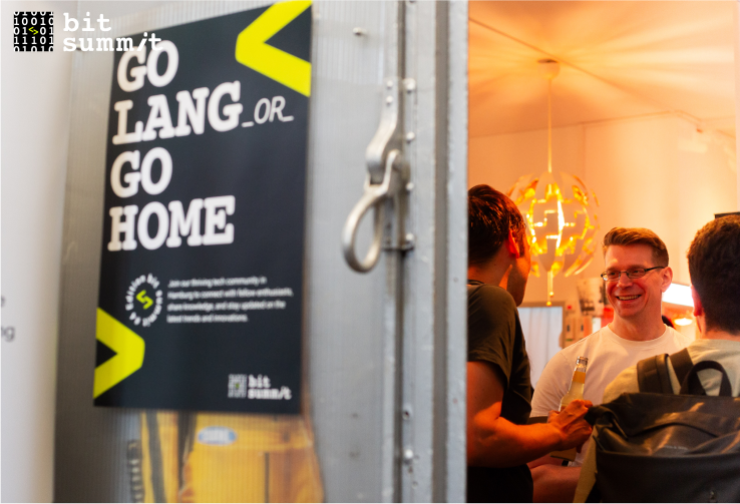 Developers talking and smiling together