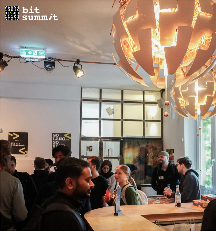 A group of people on the bit summit event